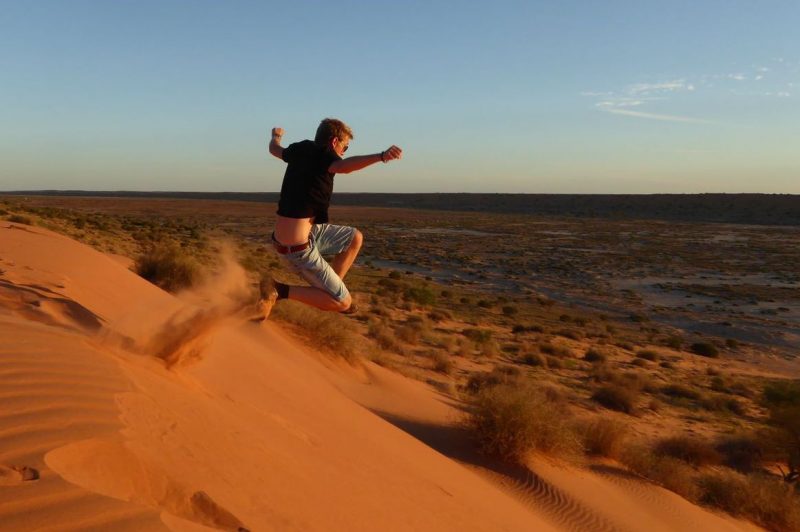 Leaping On The Sand Dunes